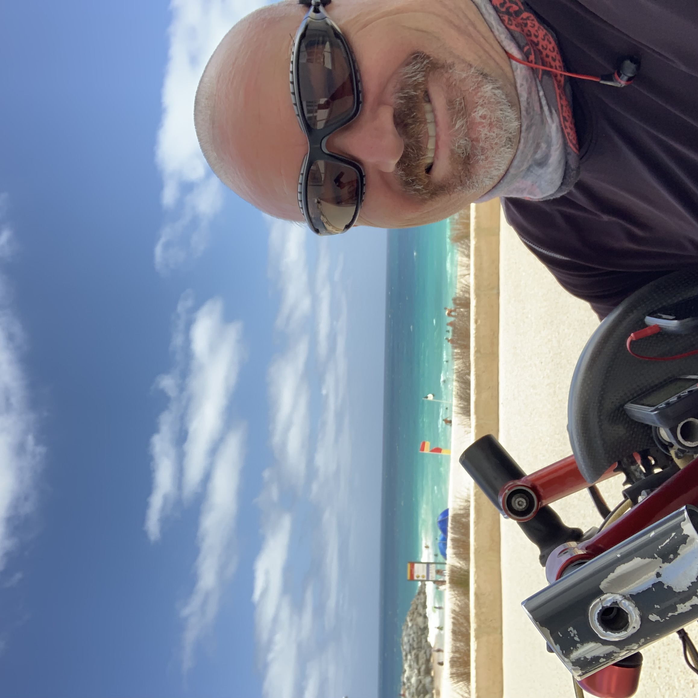 Andreas handcycling at the beach